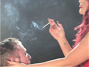 redhead superslut predominates a guy while smoking