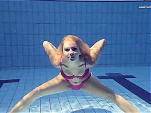 molten Elena displays what she can do under water